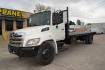2012 WHITE HINO 338 with an HINO J08E-VB 8L 260HP engine, 6SPD MANUAL transmission, located at 9172 North Fwy, Houston, TX, 77037, (713) 910-6868, 29.887470, -95.411903 - 24FT FLATBED, 33,000LB GVWR ,98" WIDE , TOOL BOX, 90 GALLON FUEL TANK, SPRING RIDE, COLD A/C , CRUISE CONTROL, POWER WINDOWS & LOCKS - Photo#0